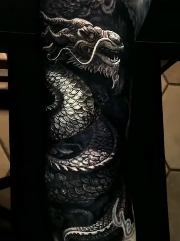Black Realistic Dragon Tattoo Newcastle | Straight Lines Tattoo